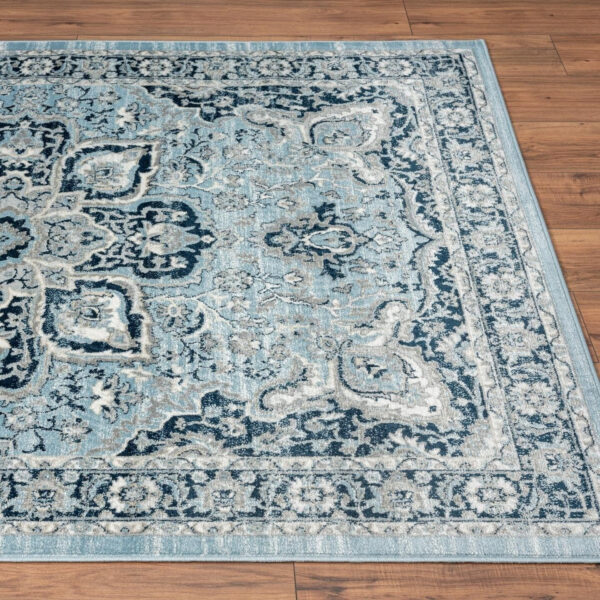 68889ce9b0a9fc135379dd6d2503ec03a4e9e172c12940cd5fce4.jpg LUXE WEAVERS Olimpia Collection 5940 Blue 8x10 Oriental Floral Area Rug