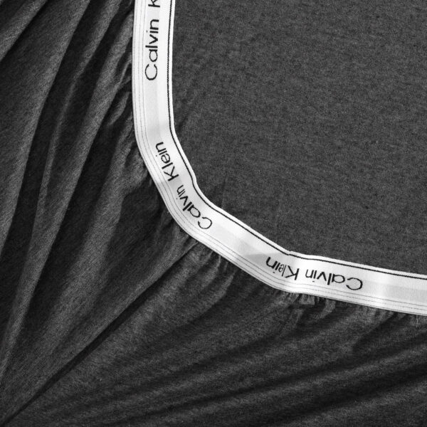 6888ab16d57eae02d53d45ce77bf1aa74063a6cf8f2e437dff4f7.jpg Calvin Klein - Queen Bed Sheets, Cotton Melange Jersey Bedding Set with Matching Pillowcases, Deep Pockets, Oeko-Tex Certified (Modern Cotton Gunmetal Grey)